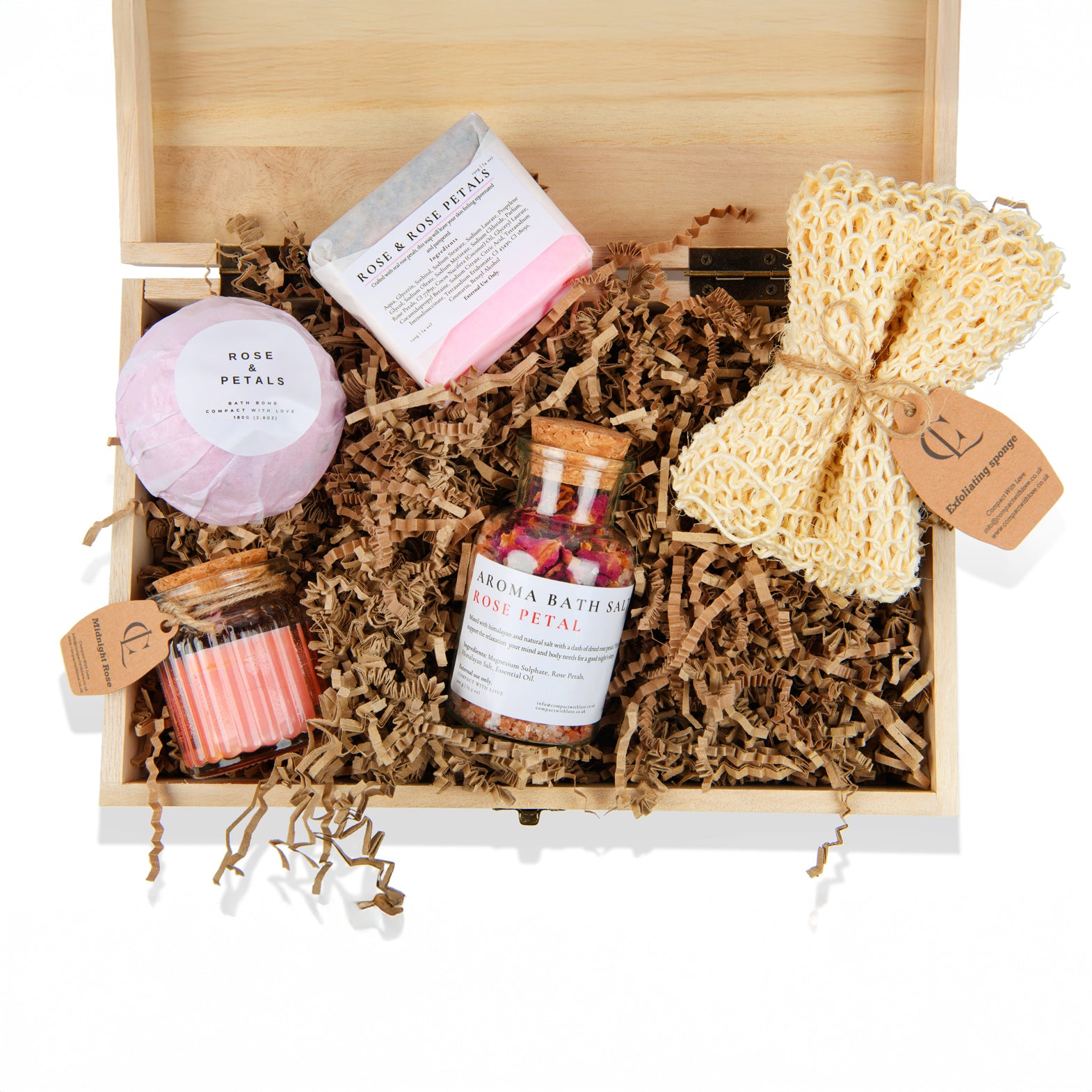 Bath and body products in a wooden gift box with decorative elements.