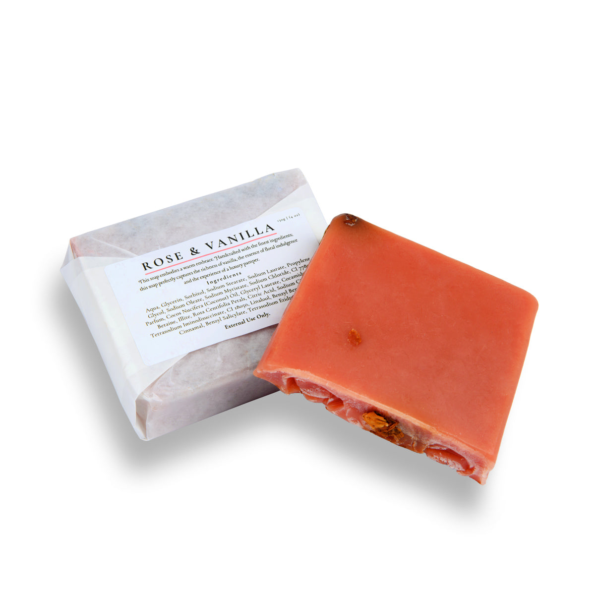 Orange soap bar with 'Rose & Vanilla' packaging on a white background