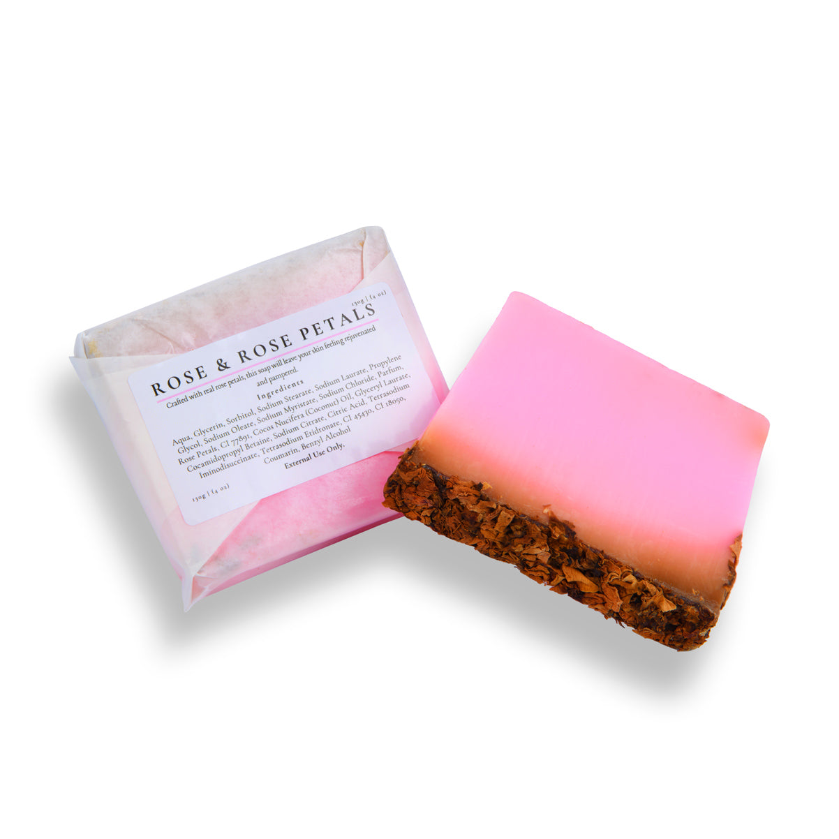 Bar of soap with gradient pink to brown color and packaging labeled 'Rose & Rose Petals' on a white background.