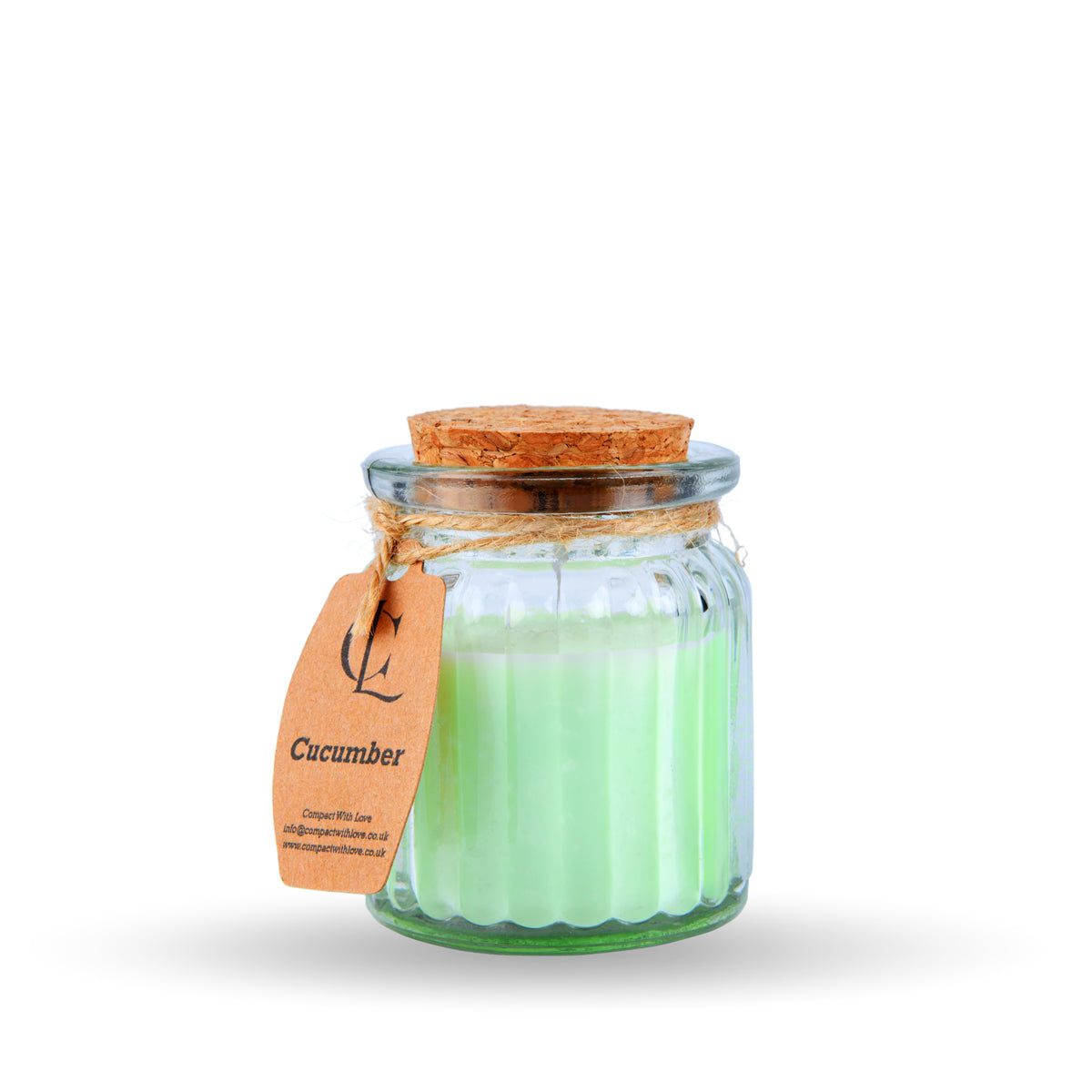 Glass jar candle labeled 'Cucumber' with a cork lid on a white background
