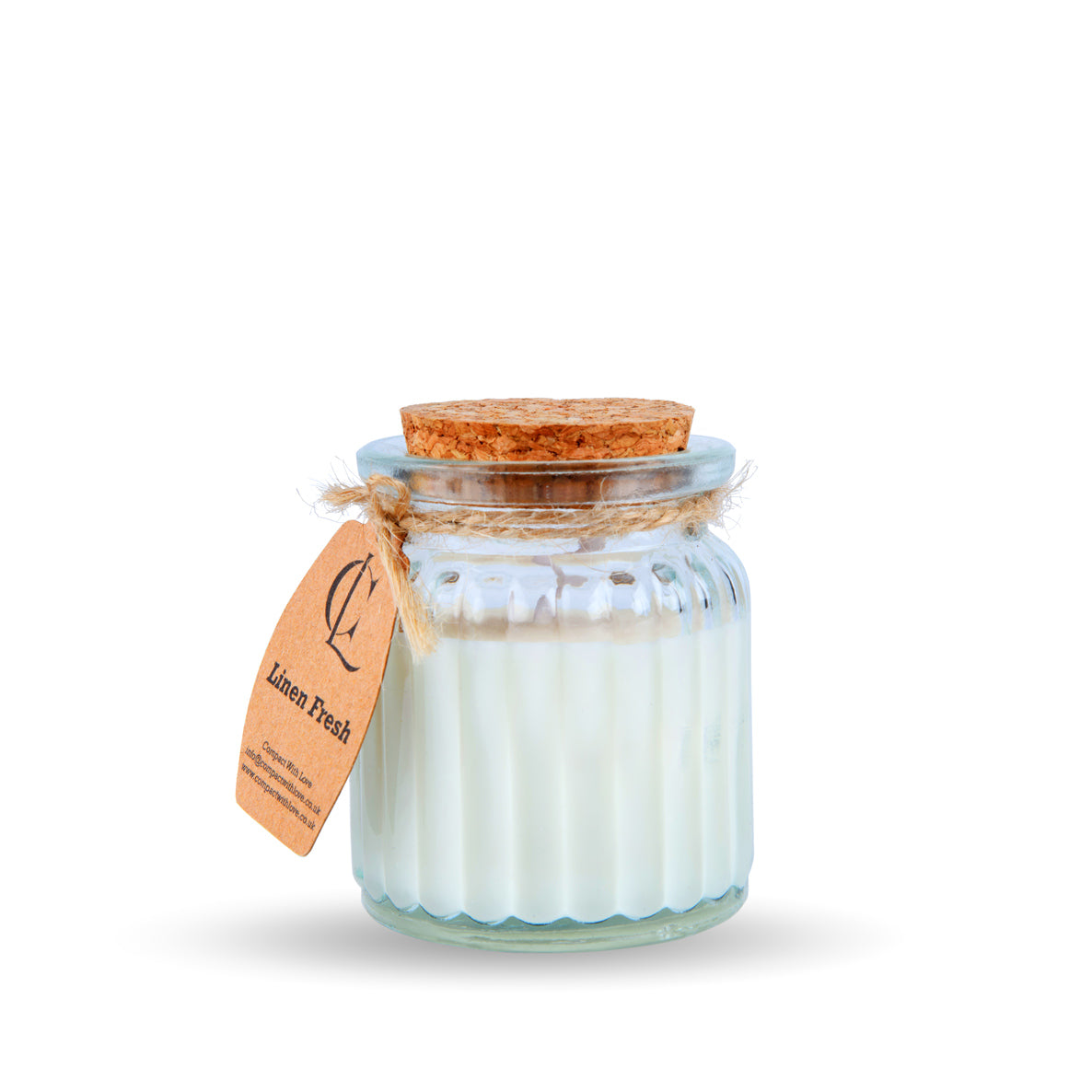 Glass candle jar with cork lid on a white background