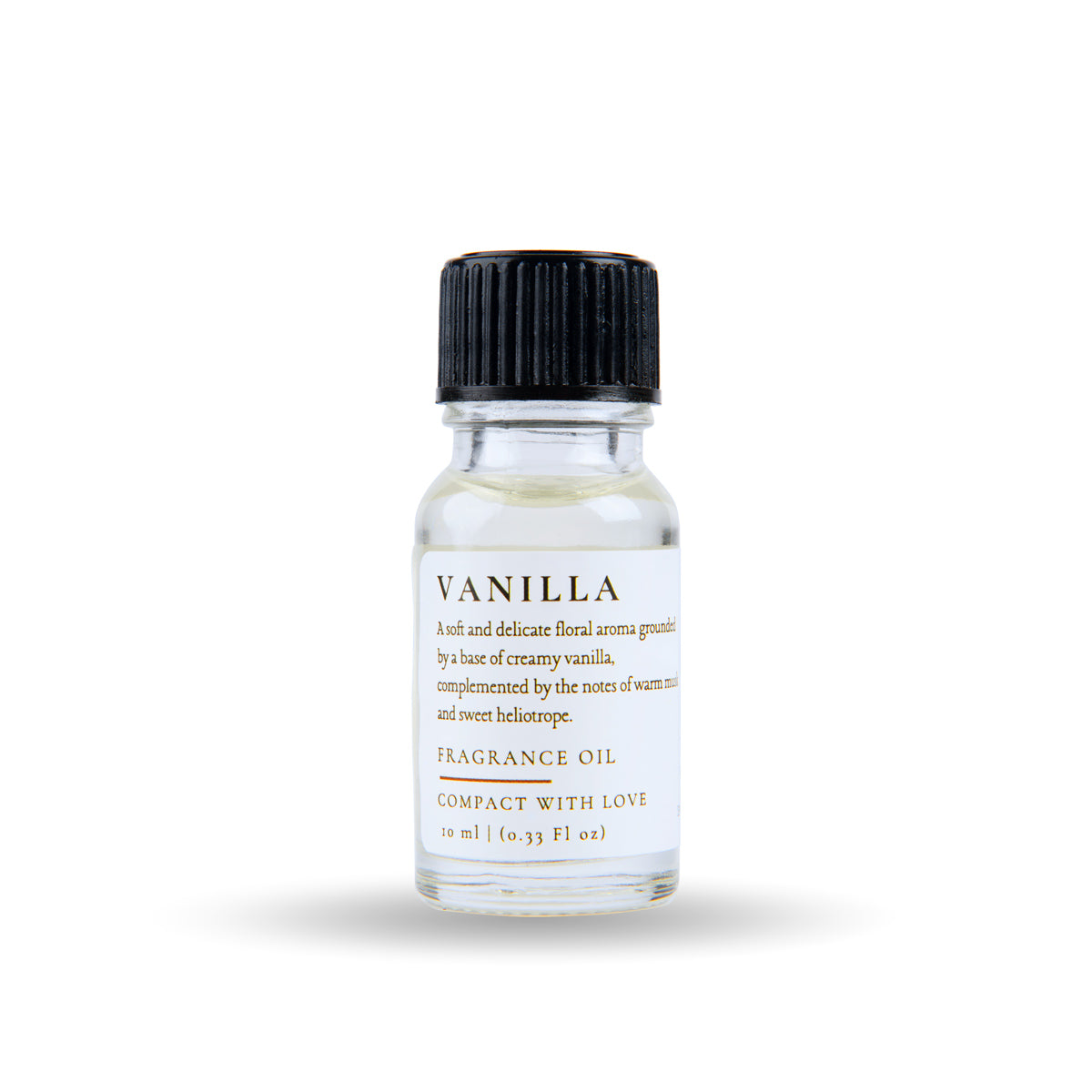 Vanilla fragrance oil bottle with black cap on a white background