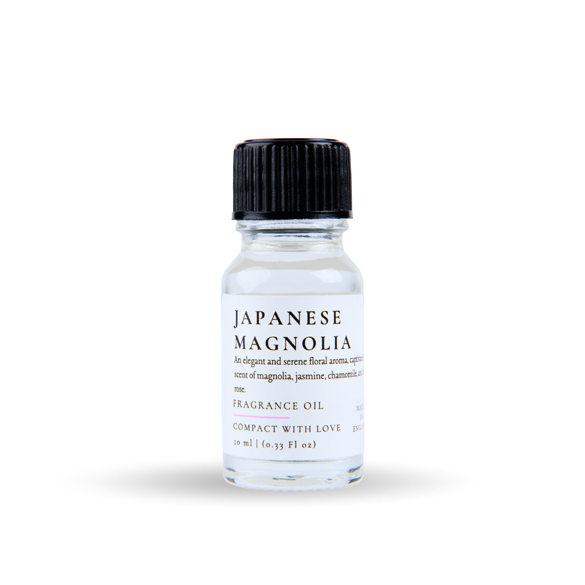 Bottle of Japanese Magnolia fragrance oil with a black cap on a white background